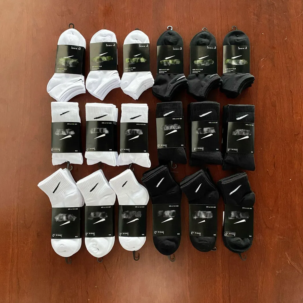 Xianghui High Quality Luxury Cotton Brand Logo Socks for Men and Women