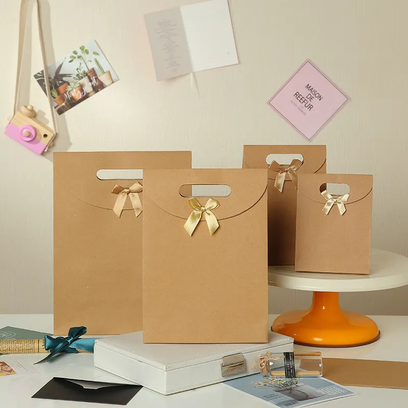 Xianghui Custom Wholesale Blank Kraft Paper Packaging Shopping Bag with Bow