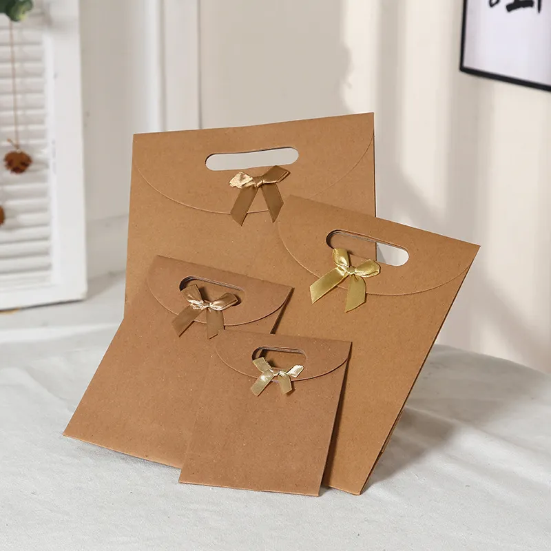 Xianghui Custom Wholesale Blank Kraft Paper Packaging Shopping Bag with Bow